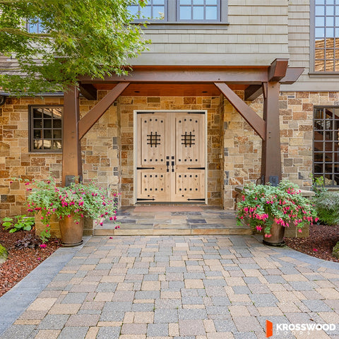 Mediterranean Knotty Alder Arch Top Speakeasy Exterior Double Door